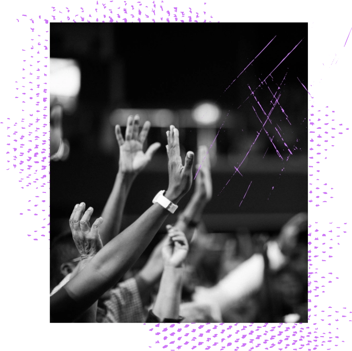 Crowd raising hands at concert